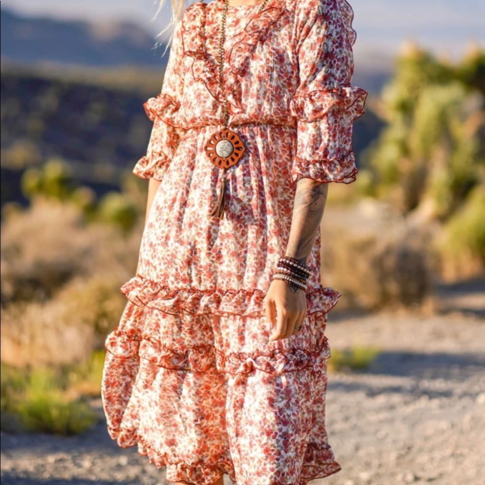This dress is Boho and on trend! Brand new!